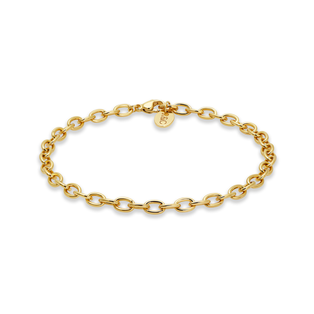 Elegant gold chain bracelet with classic cable links designed as a charm bracelet by Rani and Co jewellery