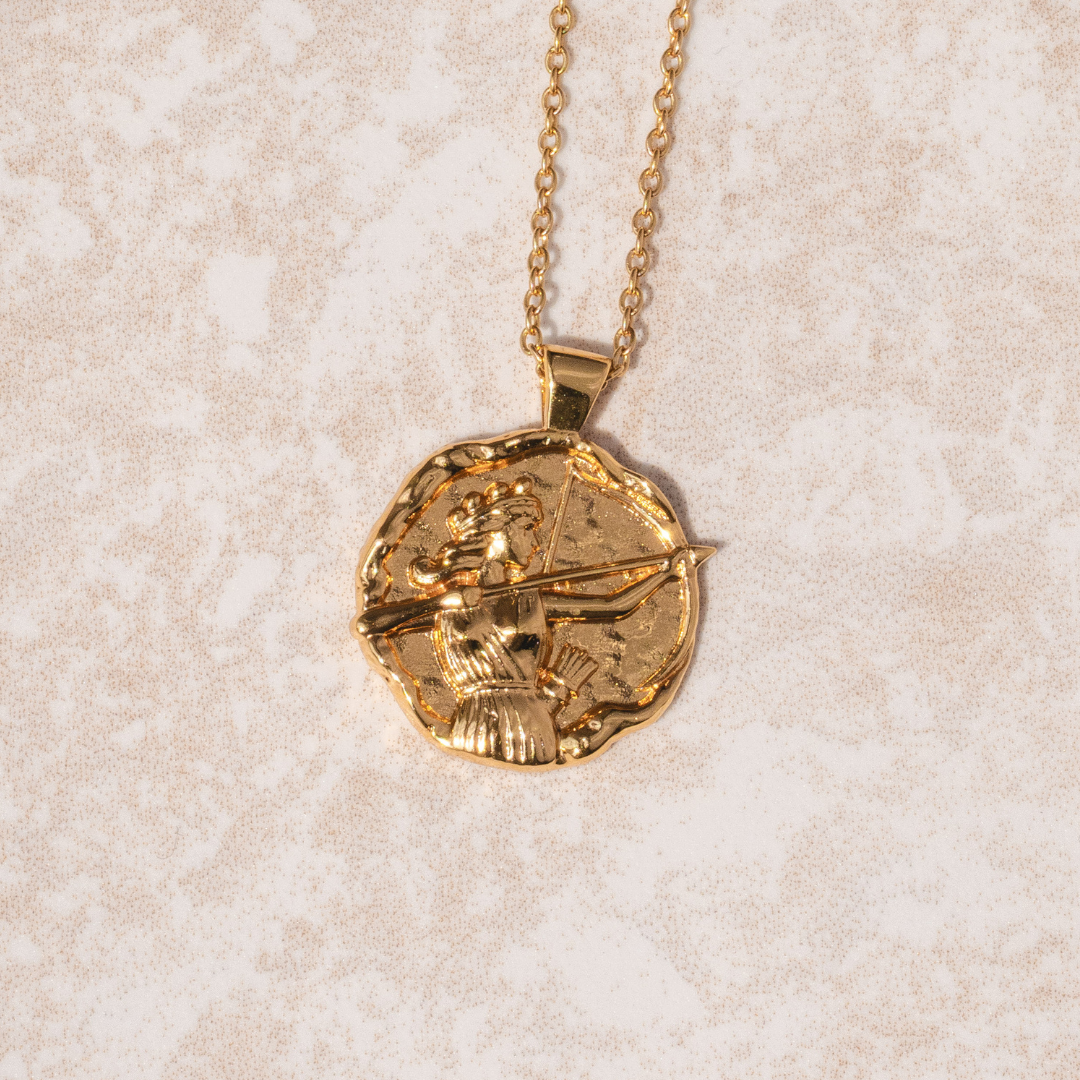 Artemis gold coin pendant necklace inspired by the Greek goddess with organic hammered molten texture by Rani and Co womens jewellery