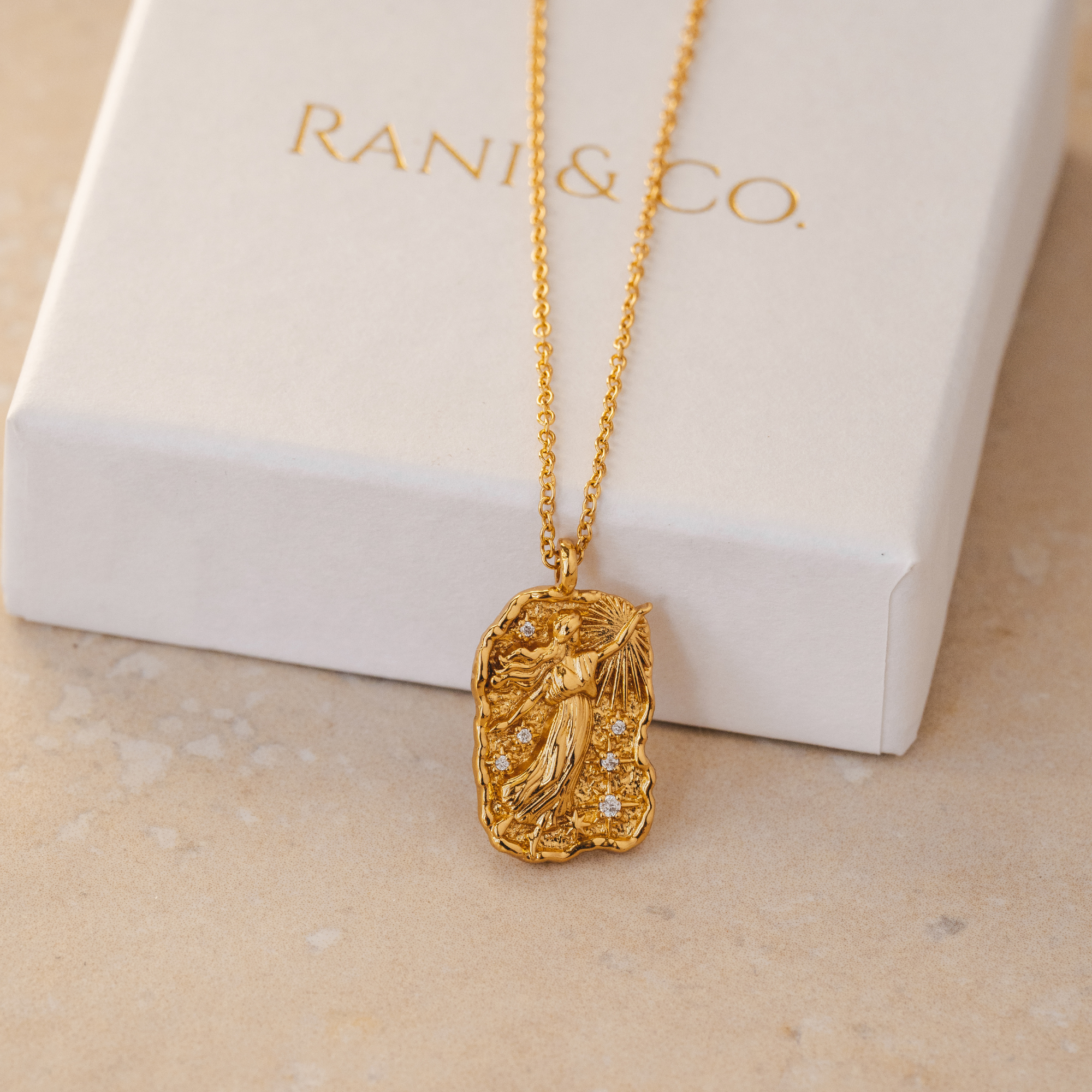 Elegant gold necklace for women with Greek goddess Asteria pendant by Rani and Co