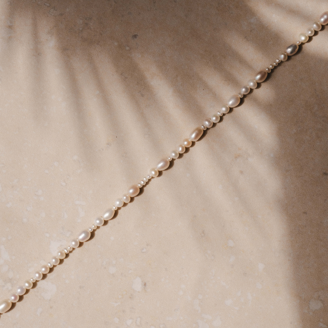 Classic pearl necklace with layered design and hypoallergenic finish by Rani and Co
