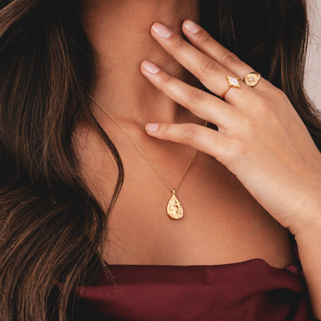 Lakshmi necklace with gold pendant featuring Hindu goddess in 18k plating by Rani and Co womens jewellery