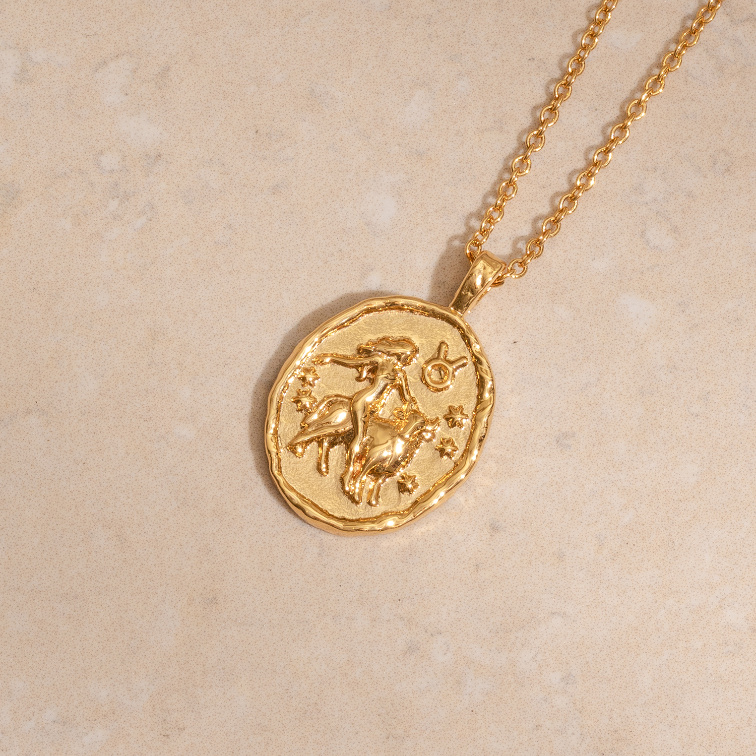 Rani & Co. Taurus zodiac coin necklace 18k gold plated pendant with bull and star constellation