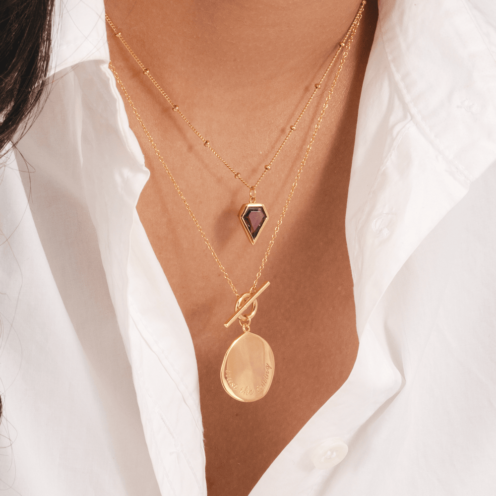 Amethyst kite shaped pendant necklace in 18k gold plated by Rani and Co womens jewellery