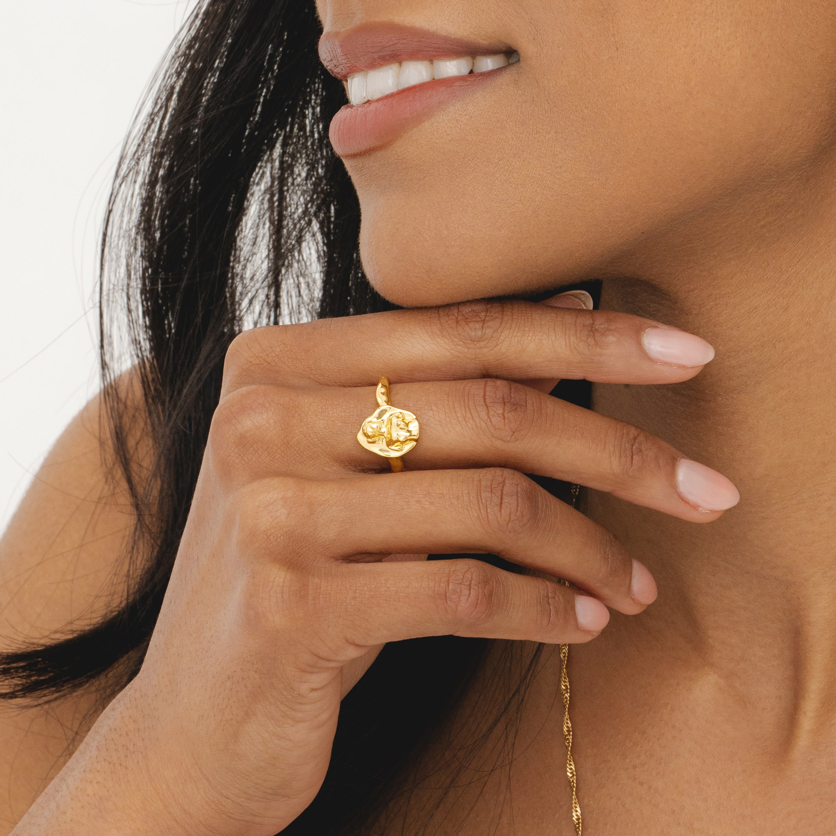 Womens jewellery by Rani and Co featuring the Goddess Aphrodite Ring in radiant hammered gold plating