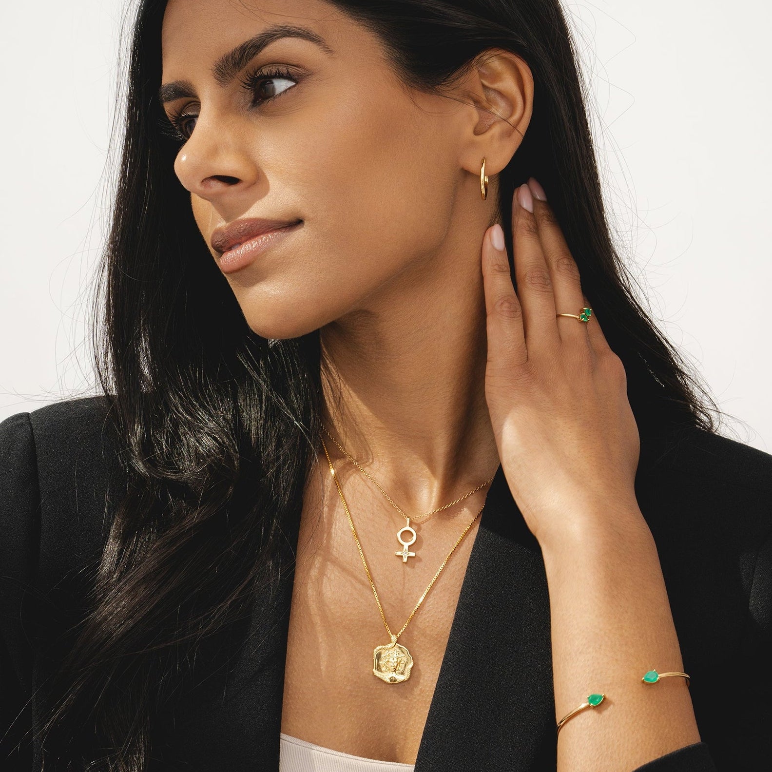 Womens jewellery by Rani and Co showcasing a gold chain female necklace with radiant rainbow moonstone