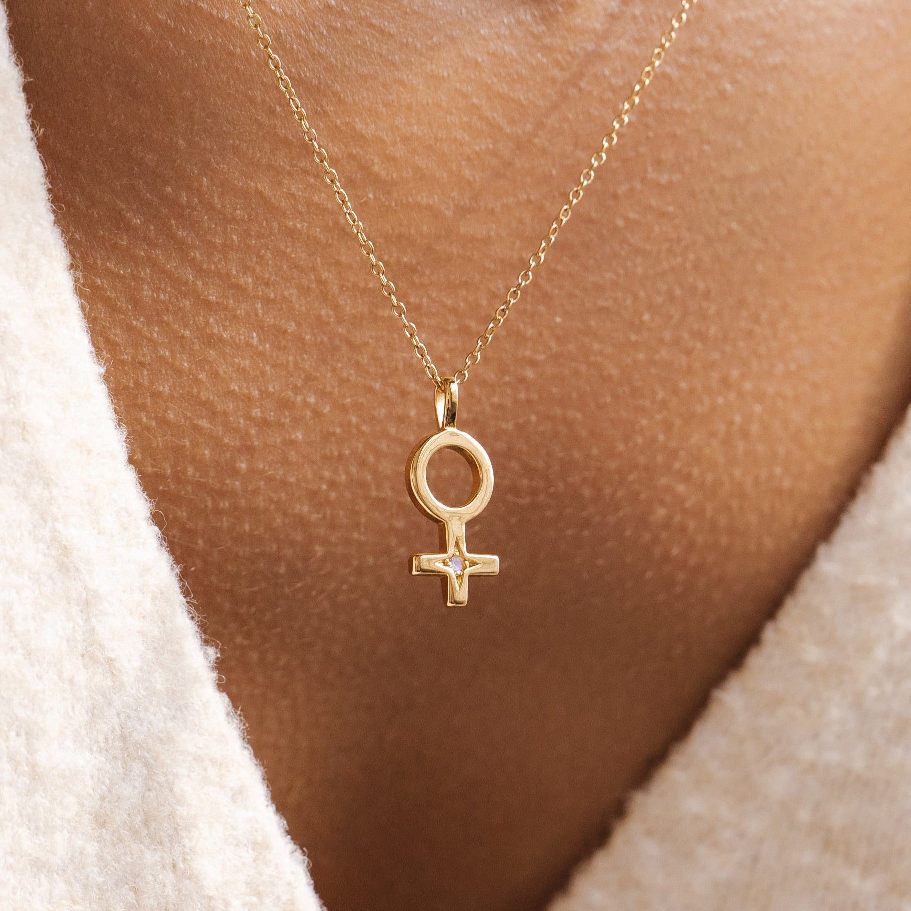 Womens jewellery by Rani and Co showcasing a gold chain female necklace with radiant rainbow moonstone