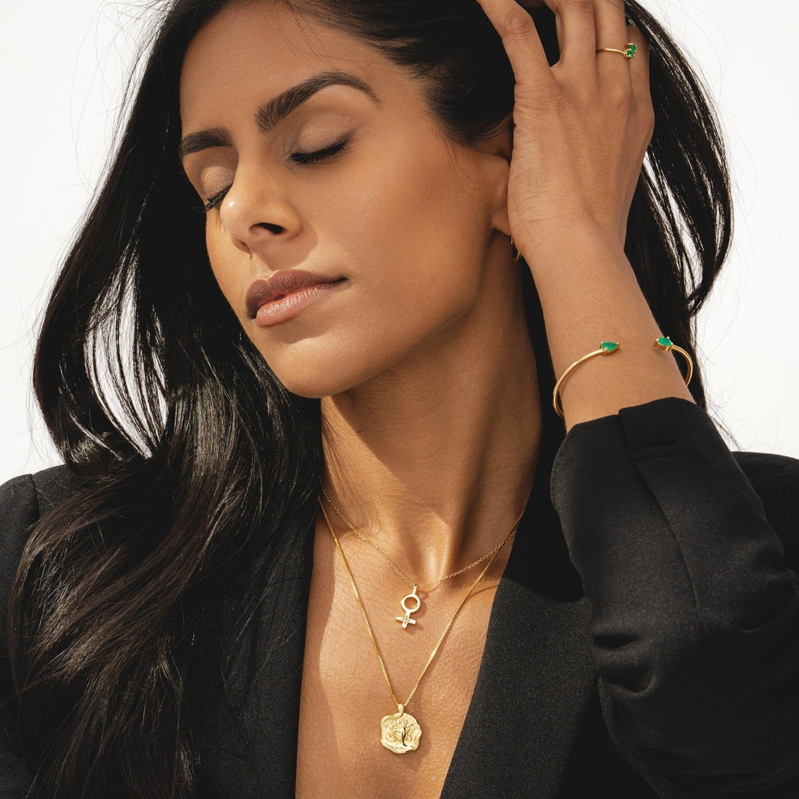 Medusa necklace featuring a gold pendant design inspired by the Greek goddess crafted for women by Rani and Co