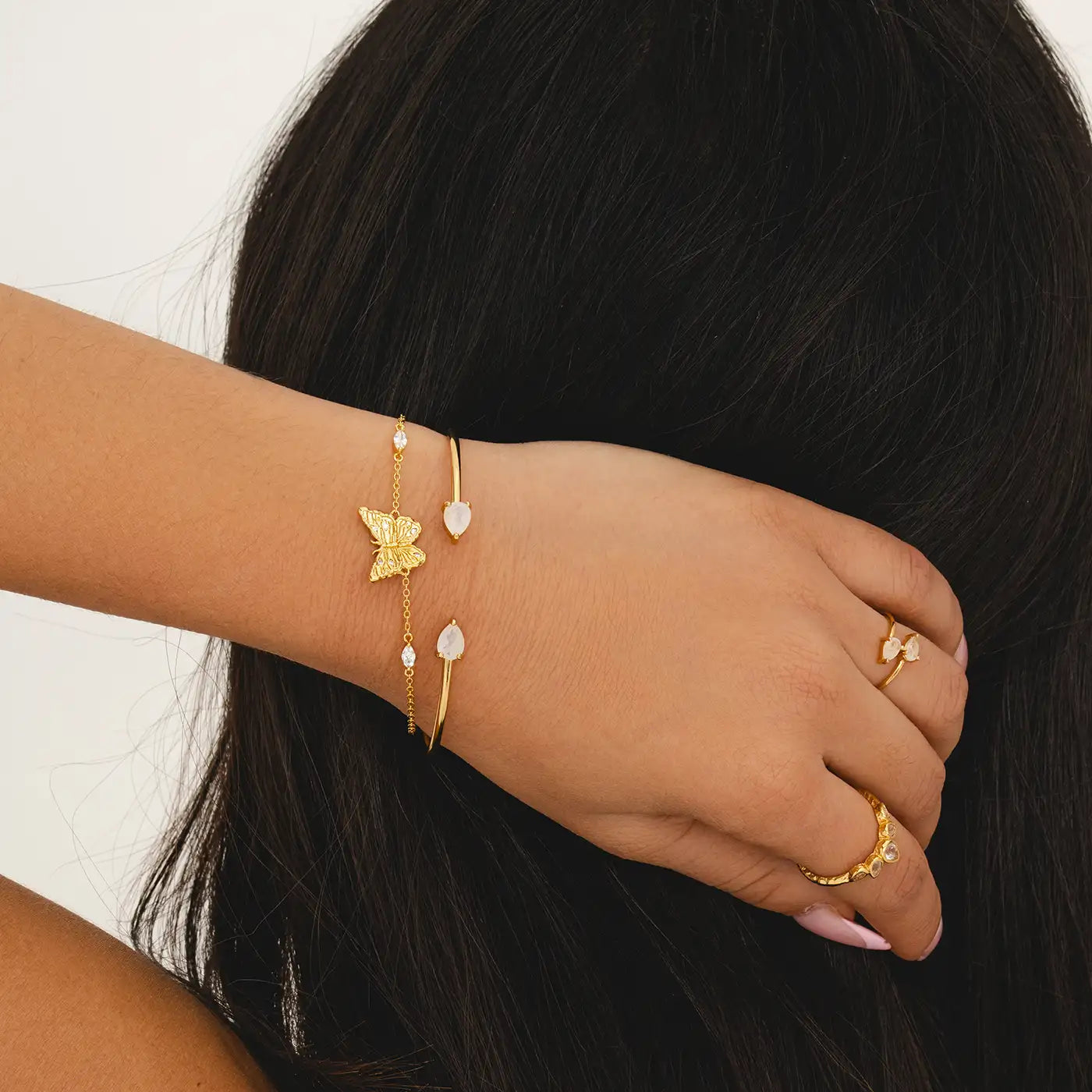 Fine gold chain bracelet with butterfly charm and marquise cubic zirconia accents, 160mm length