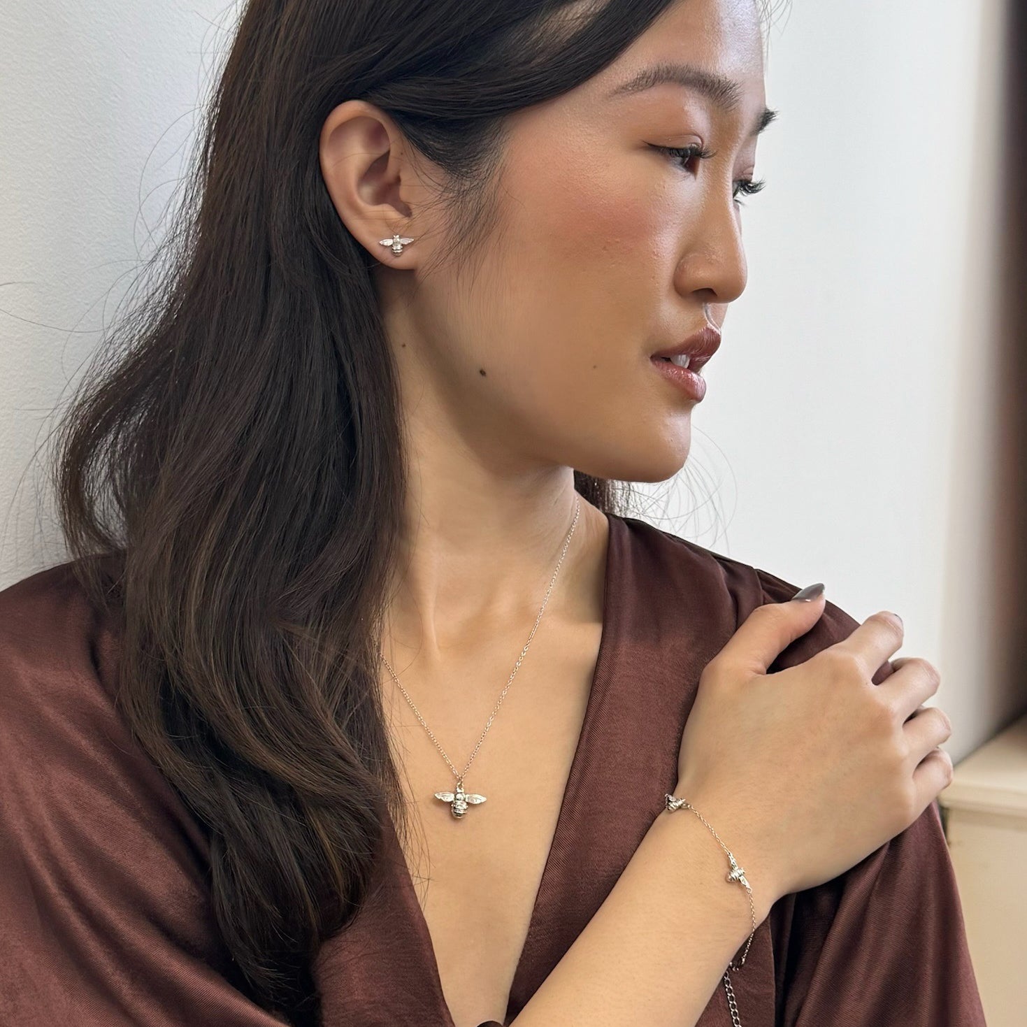Silver necklaces womens jewellery by Rani and Co featuring a delicate design bumble bee necklace in silver