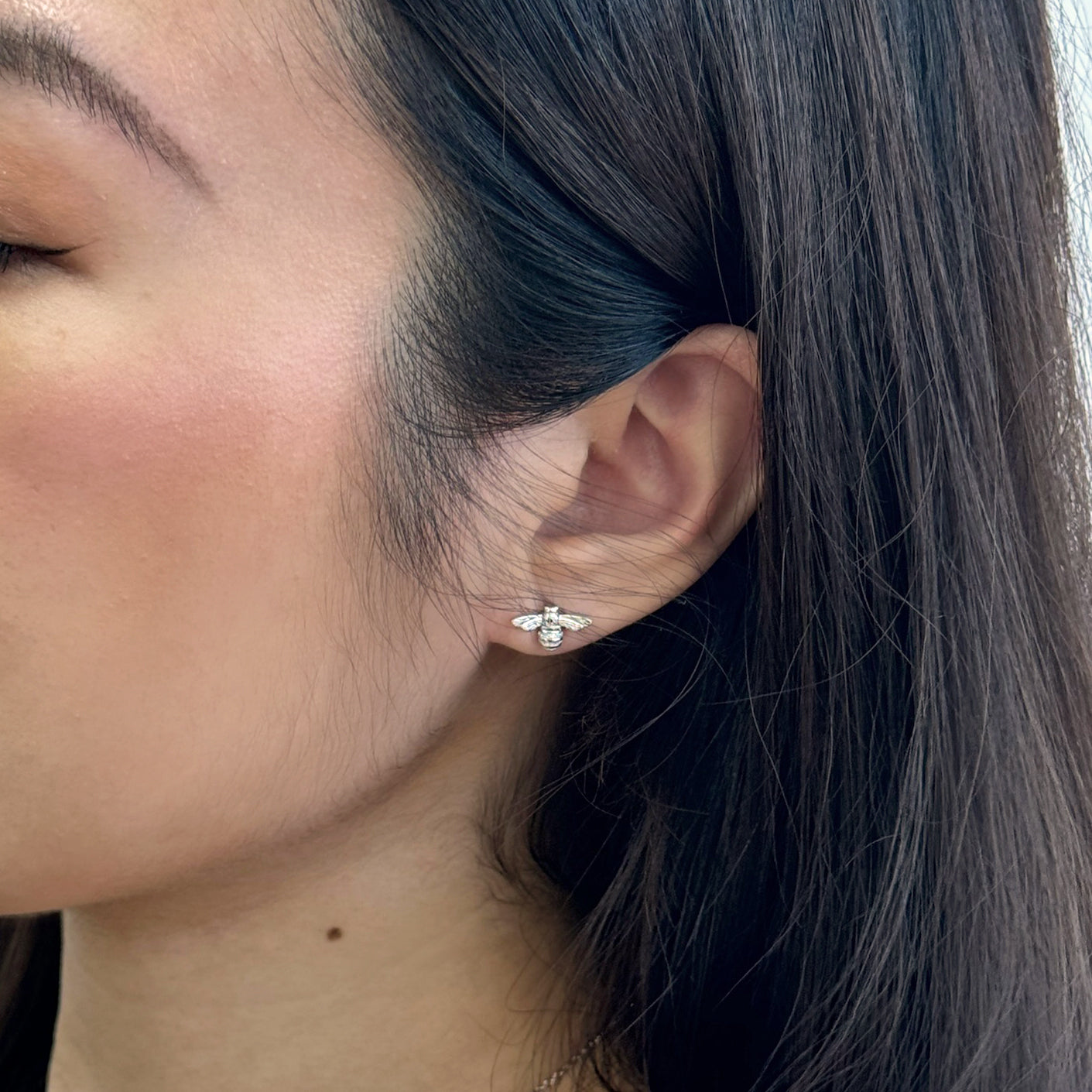 Bumble bee stud earrings in silver designed for women’s jewellery collections by Rani and Co