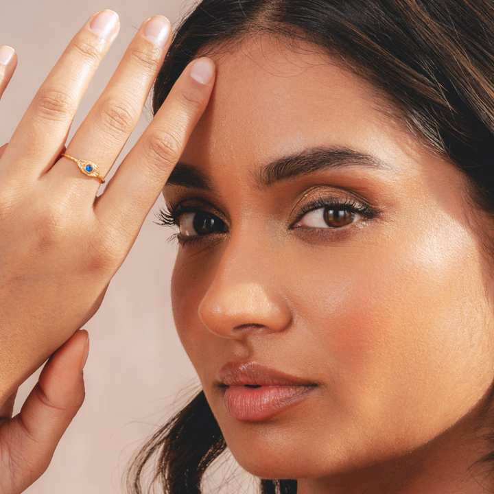 Gold ring with protective evil eye design in 18k plated finish by Rani and Co womens jewellery