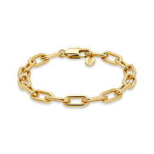 Gold chunky chain link bracelet styled as a charm bracelet by Rani and Co jewellery