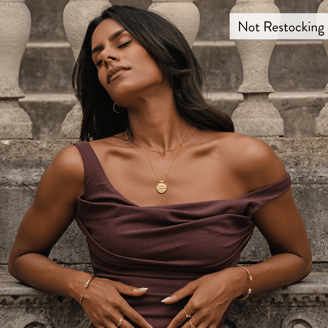 Limited Edition Goddess Durga Amethyst Necklace worn with elegant styling and not restocking limited edition message.