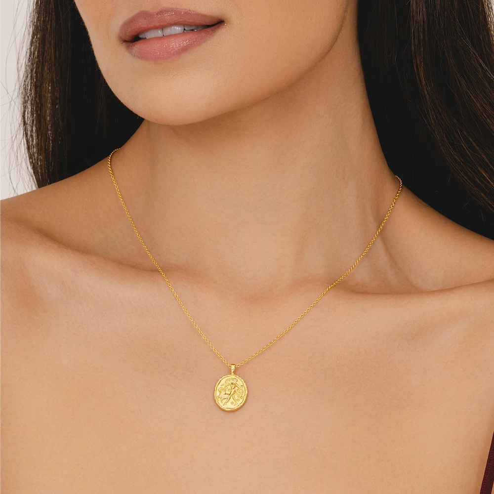 Rani & Co. gold Aries zodiac pendant necklace, embossed woman ram and stars 18k plated