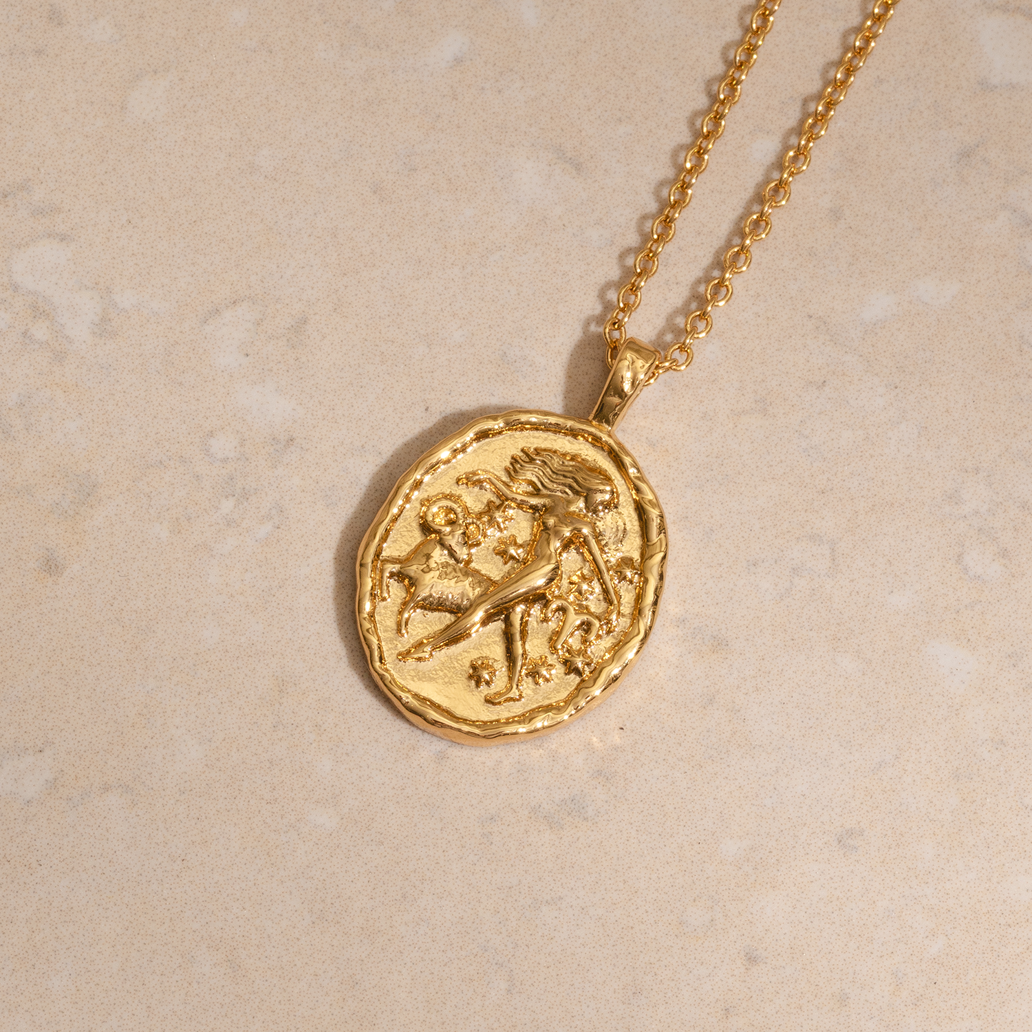 Rani & Co. Aries zodiac coin necklace 18k gold plated, embossed woman and ram constellation