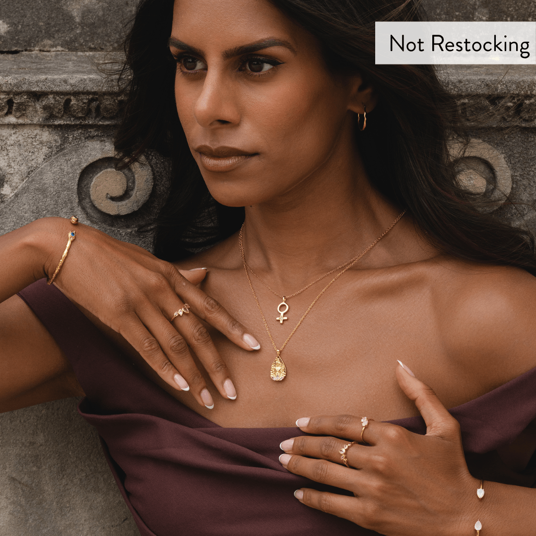 Limited Edition Goddess Lakshmi Rose Quartz Necklace worn with layered gold jewellery for elegant everyday styling.