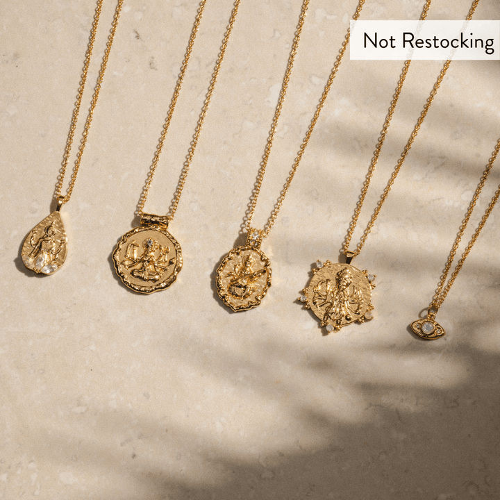 Limited Edition Goddess Lakshmi Rose Quartz Necklace displayed with the Limited Edition Goddess Collection necklaces.