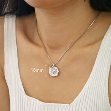 Silver necklace featuring a Medusa pendant a bold piece of Greek jewellery by Rani and Co