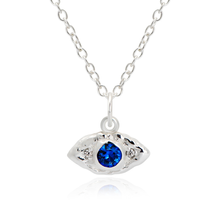 Silver evil eye necklace with molten texture and blue stone by Rani & Co. jewellery