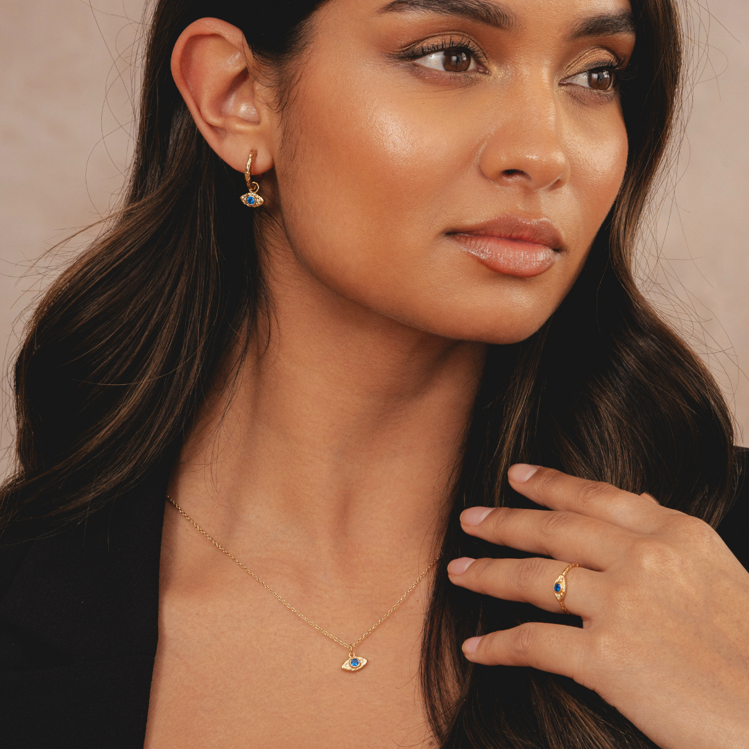Womens gold necklace featuring an elegant evil eye charm in 18k plating by Rani and Co
