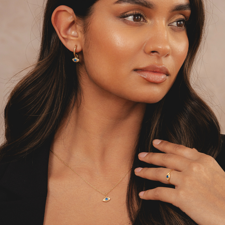 Womens gold necklace featuring an elegant evil eye charm in 18k plating by Rani and Co