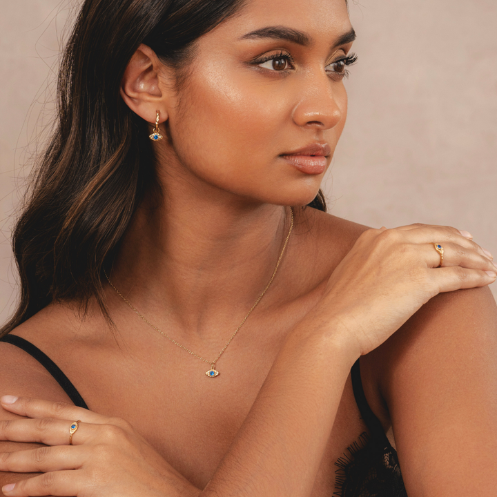 Womens gold necklace featuring an elegant evil eye charm in 18k plating by Rani and Co