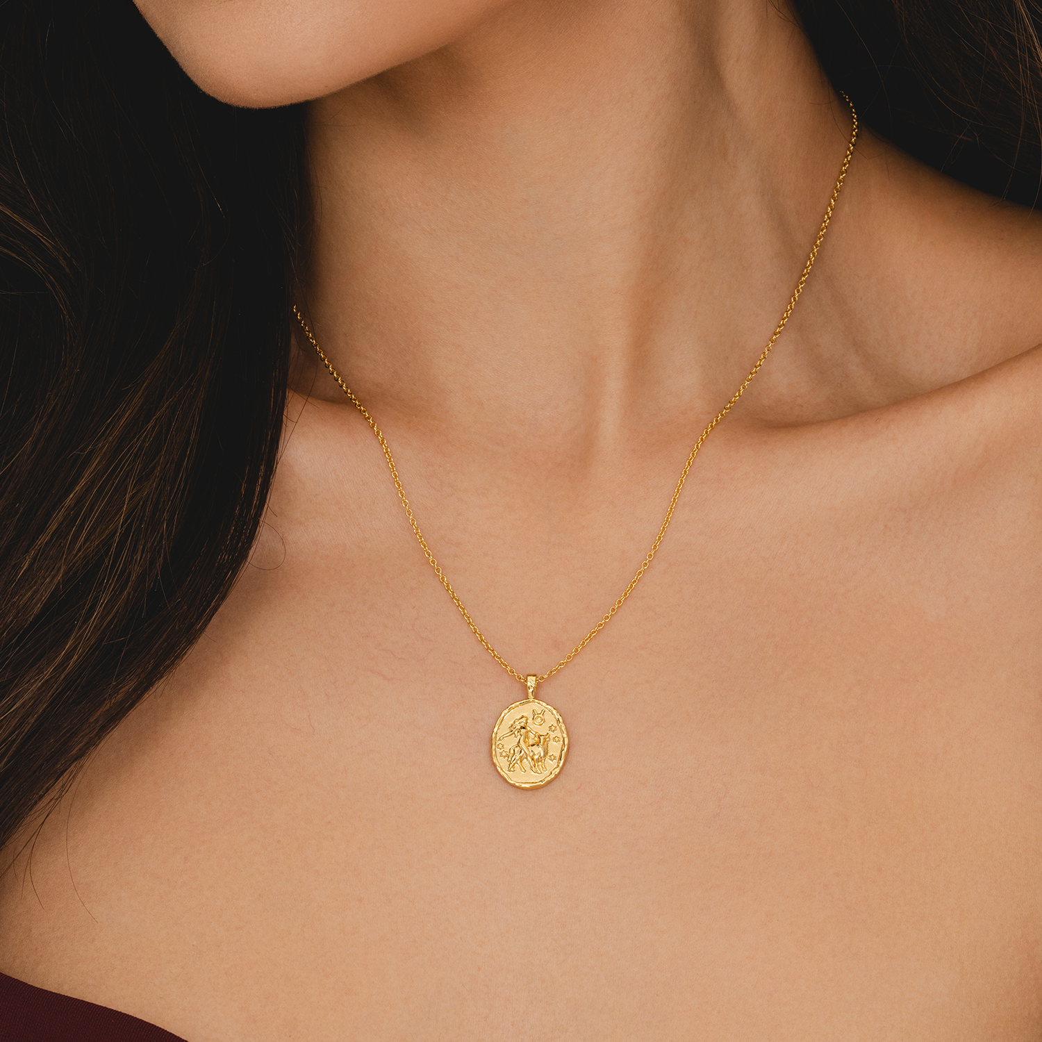 Rani & Co. gold Taurus zodiac pendant necklace, embossed bull symbol and stars 18k plated