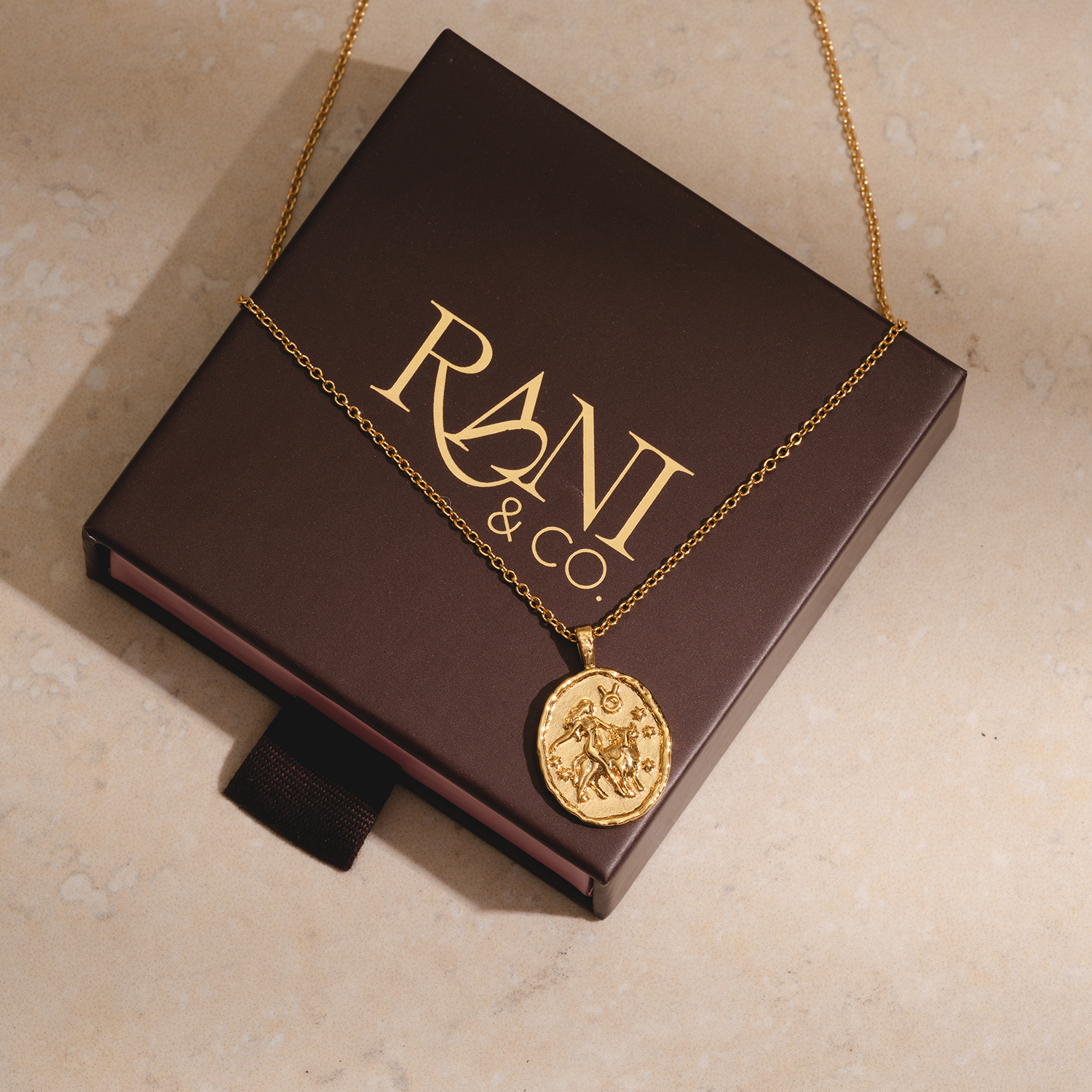 Rani & Co. gold Taurus zodiac coin necklace, 18k plated star sign jewellery birthday gift