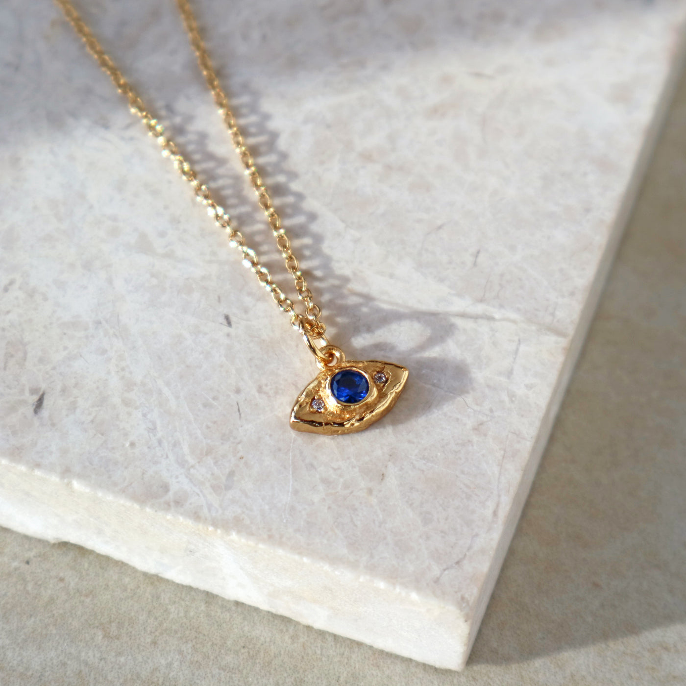 evil eye organic molten hammered golf necklace, Rani & Co jewellery