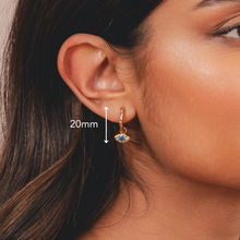 Gold hoop earrings with evil eye jewellery details in 18k plated finish by Rani and Co womens jewellery