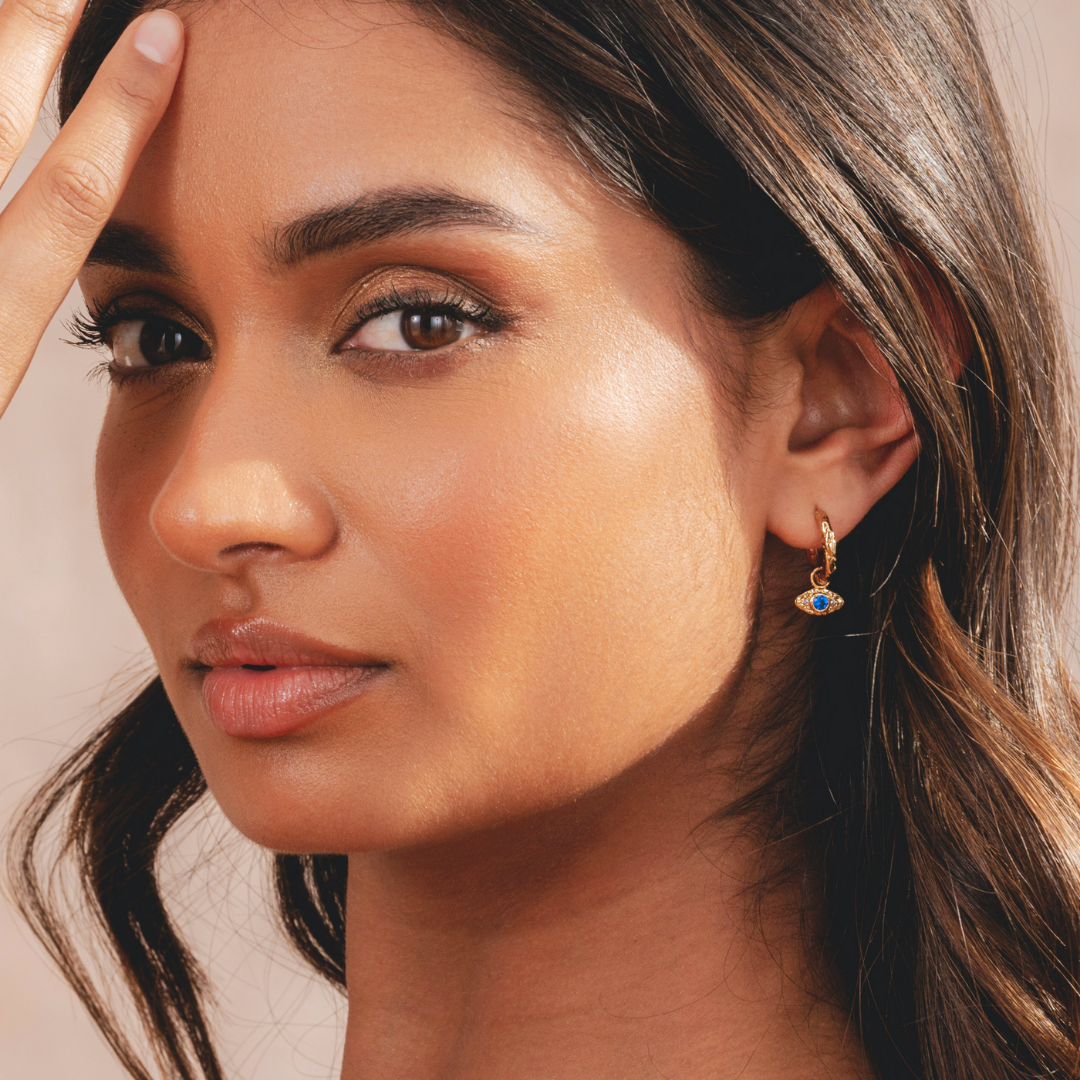 Elegant 18k plated gold hoop earrings featuring evil eye design by Rani and Co womens jewellery