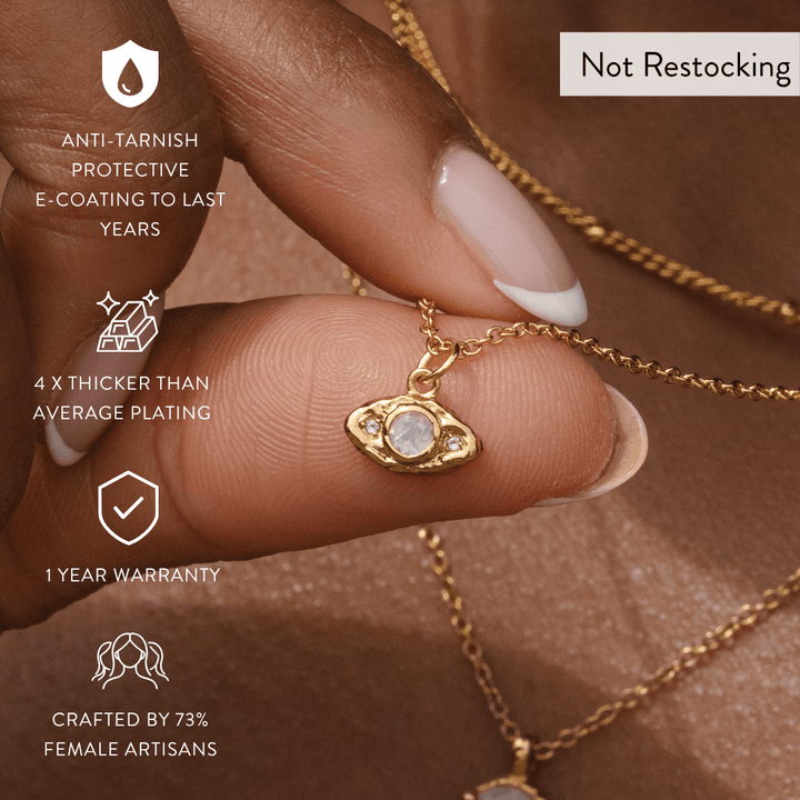 Limited Edition Evil Eye Moonstone Necklace showing anti-tarnish finish, thick gold plating and one-year warranty.