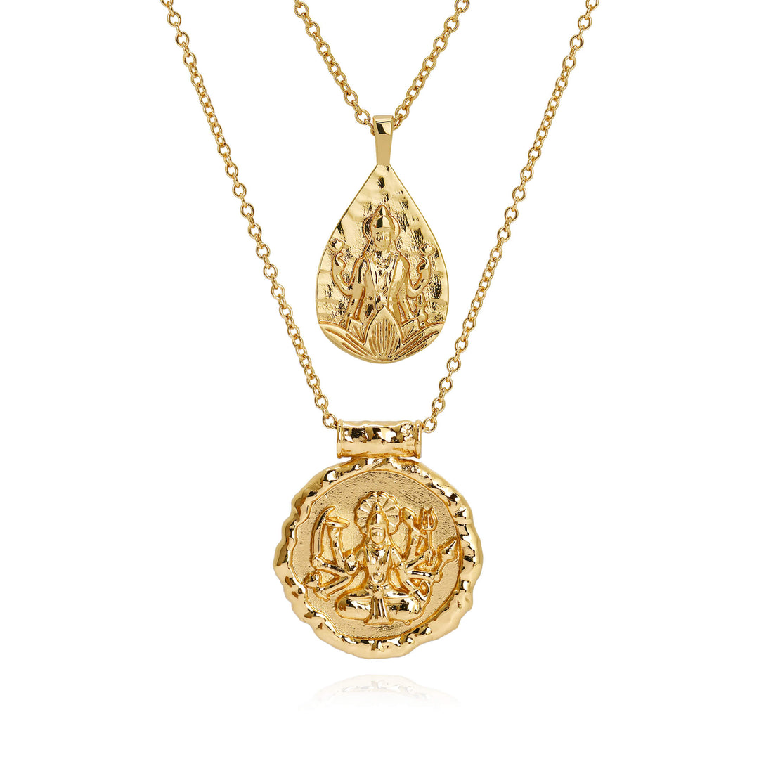 Goddess Durga and Lakshmi necklace set in 18k gold, teardrop and coin pendants layered on white background