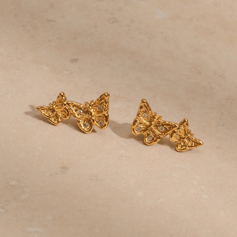 Dainty gold butterfly climber earrings front and back view, nickel-free sustainable jewellery