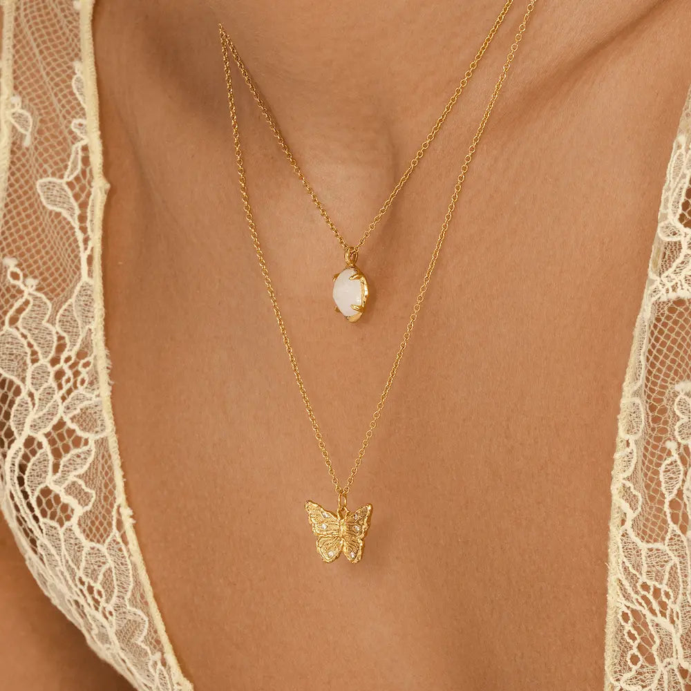 Delicate gold butterfly necklace with engraved wing detail and cubic zirconia, meaningful gift jewellery