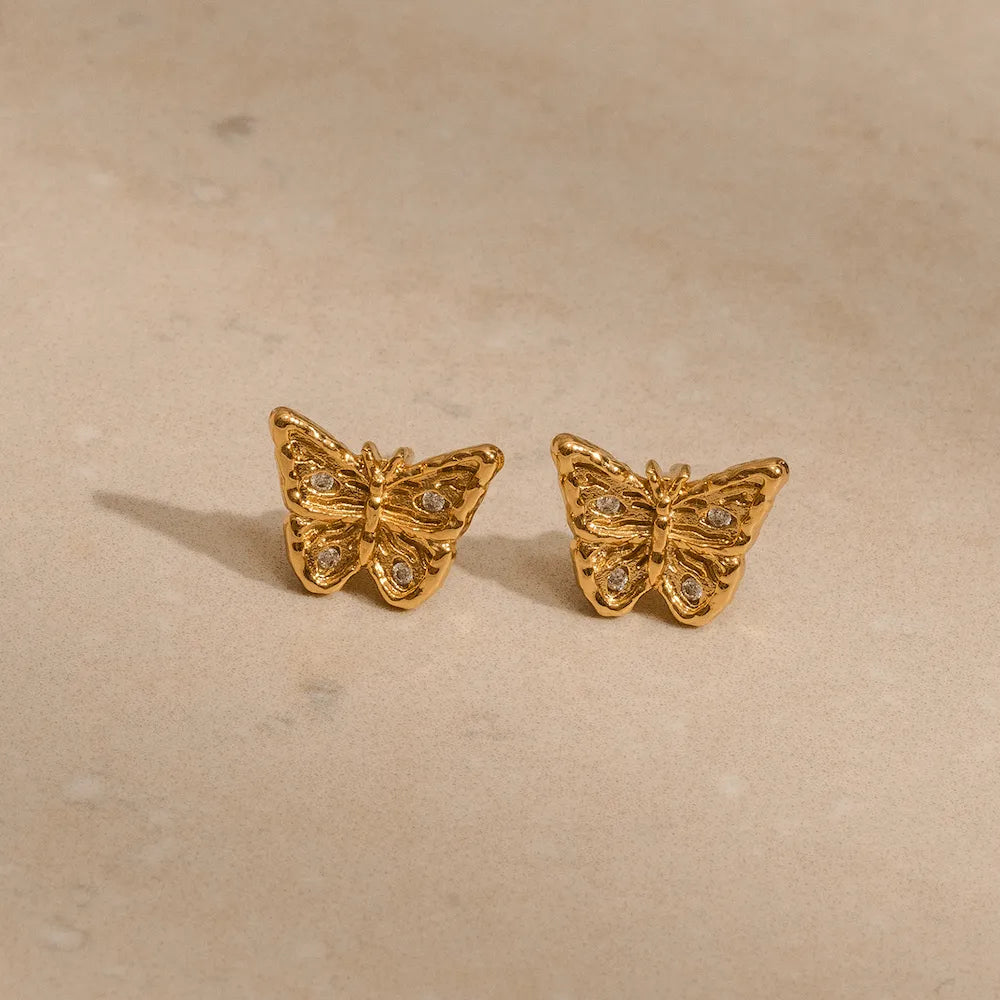 Miniature gold-plated butterfly earrings with filigree detail and cubic zirconia, ethical jewellery