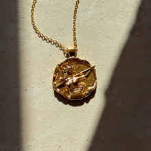 Artemis gold coin pendant necklace inspired by the Greek goddess with organic hammered molten texture by Rani and Co womens jewellery
