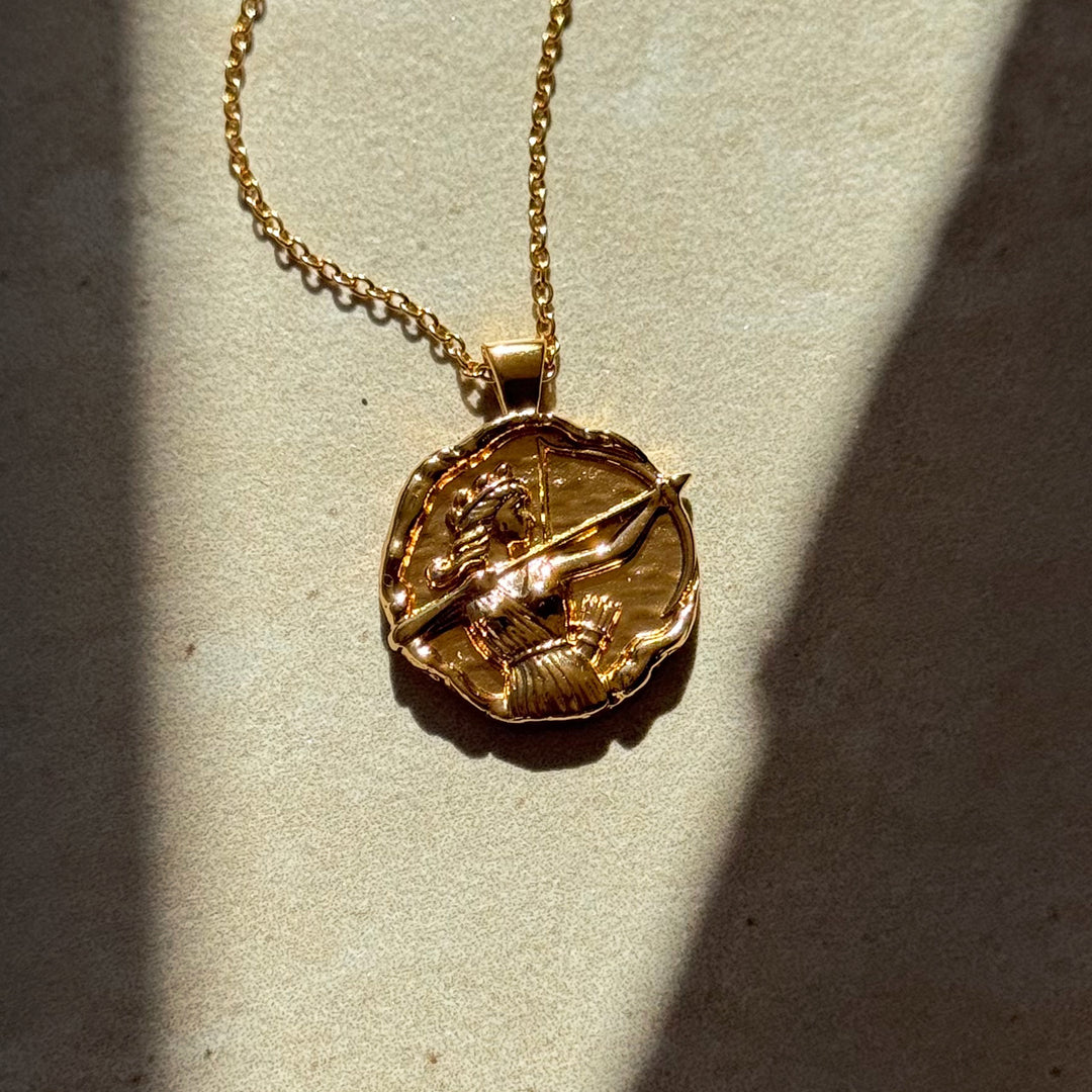 greek goddess artemis gold coin pendant necklace with organic hammered molten texture, Rani & Co. womens jewellery uk 1
