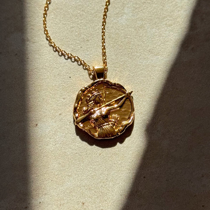 greek goddess artemis gold coin pendant necklace with organic hammered molten texture, Rani & Co. womens jewellery uk 1