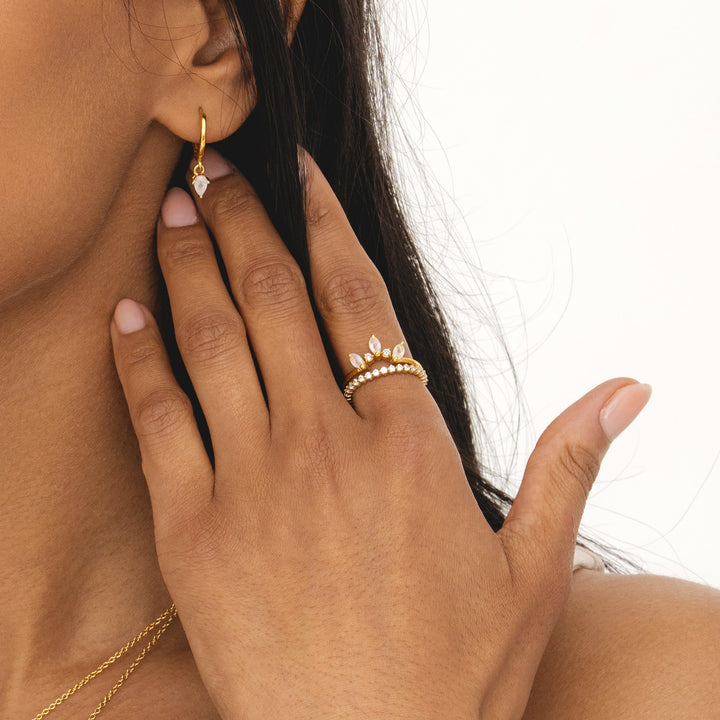 Tri-marquise moonstone gold crown ring, reflecting rainbow hues. Rani & Co. jewellery