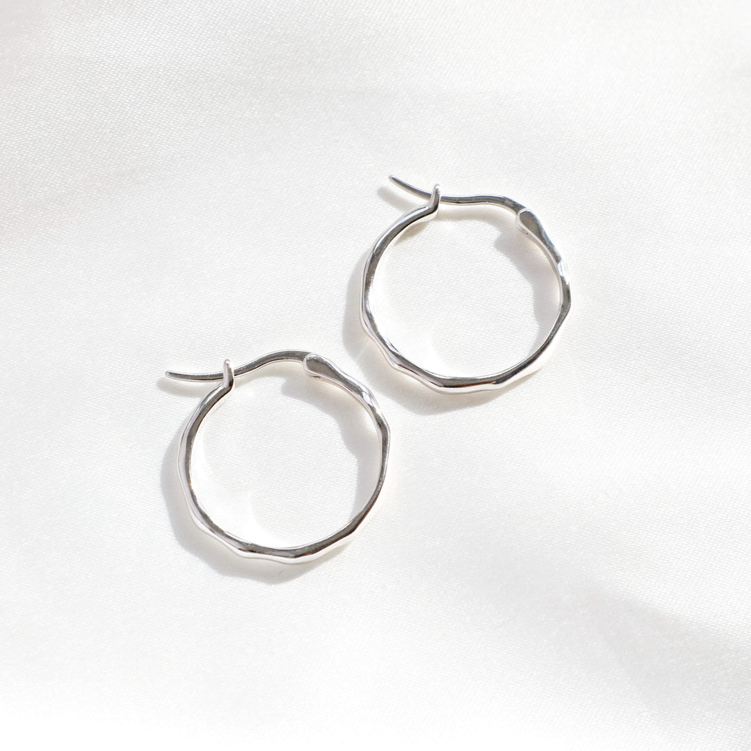 Irregular hoop earrings in silver – lightweight thin hoops for women, modern silver jewellery by Rani and Co