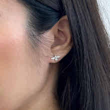 Silver stud earrings for women featuring delicate bumble bee studs in silver by Rani and Co