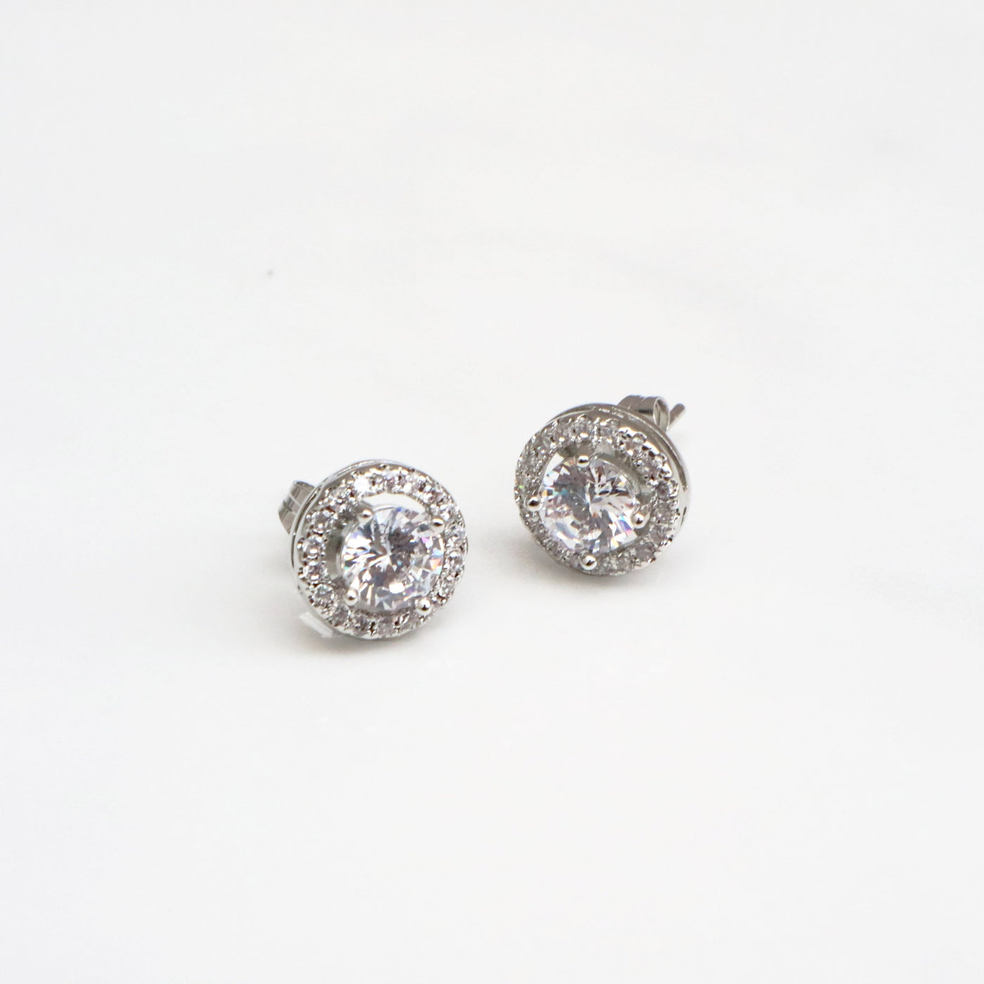 10mm Silver Cubic Zirconia Stud Earrings with a 6mm cubic zirconia central stone surrounded by smaller zirconia stones.