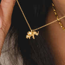 Gold chain necklace featuring an elephant pendant a meaningful piece of womens jewellery by Rani and C