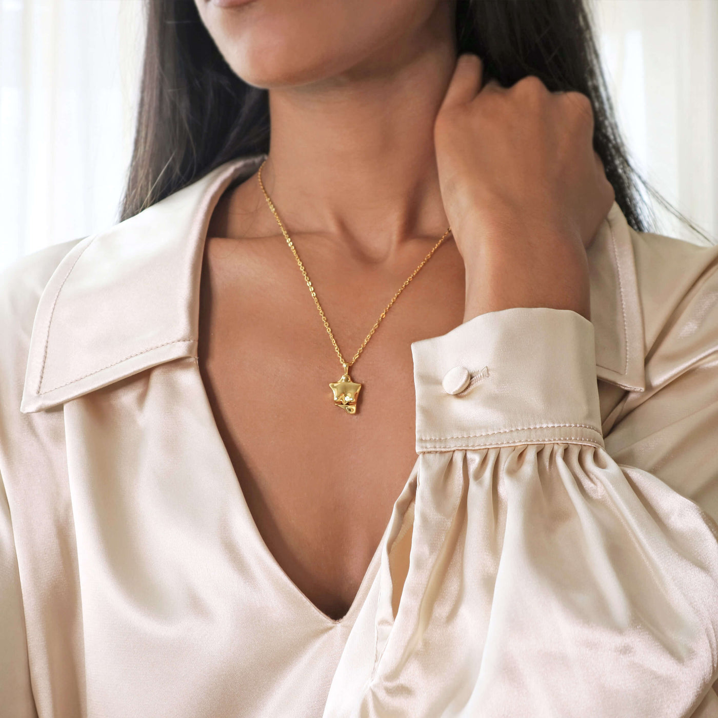 Female body gold pendant necklace, Rani & Co. 