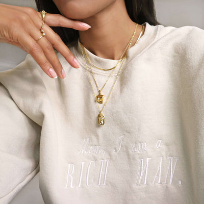 Female body gold pendant layered necklaces, Rani & Co. jewellery uk