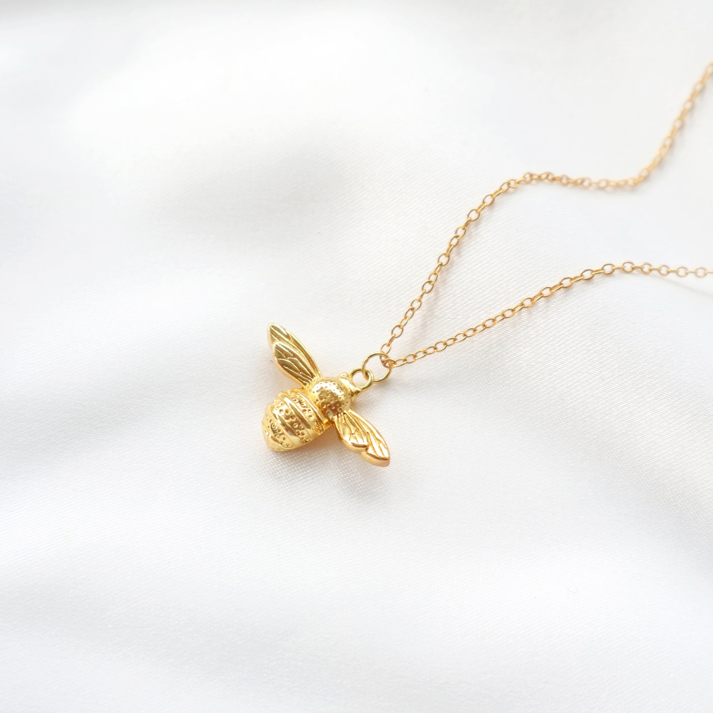 Dainty gold honey bumble bee pendant necklace, Rani & Co. jewellery