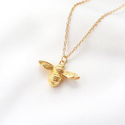Gold Queen Bumble bee pendant necklace, dainty animal necklace. Rani & Co. jewellery